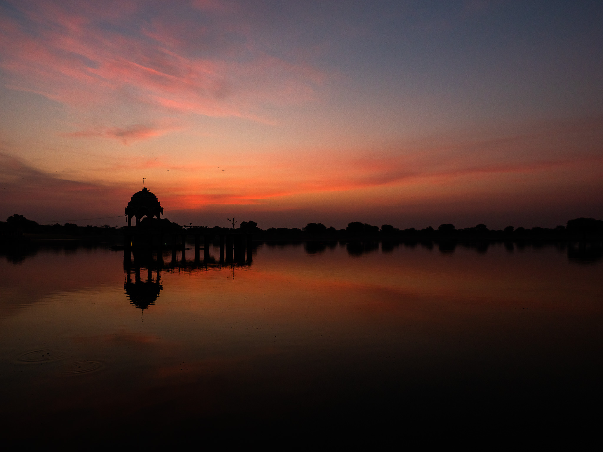 Sunrise at Gadissar Lake — a lake in the middle of the desert